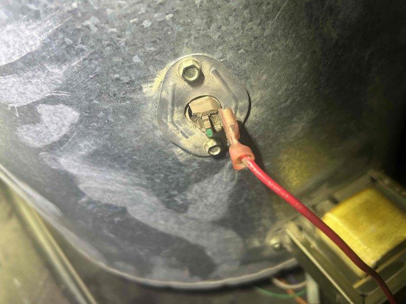 Responded to callback for non-functioning thermostat on upstairs HVAC unit that customer reported had been problematic since before Christmas. Inspected system and found loose electrical connection at the terminal. Secured the red wire with spade terminal connector to restore proper functionality.