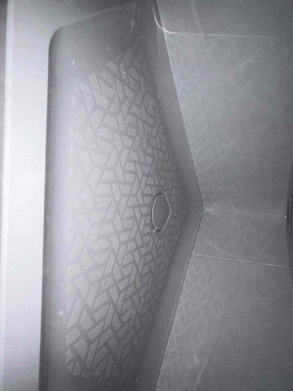 Completed final phase of basement bathroom installation project, including setting the shower base with proper drainage and connecting PEX water supply lines. Finalized plumbing rough-in work within the framed wall cavity, ensuring all connections were secure and properly aligned with the ventilation system prior to client's planned wall completion.