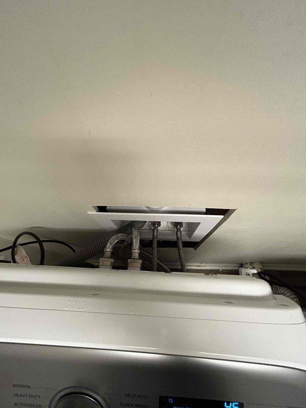 Diagnosed and repaired low water pressure issue affecting washing machine. Accessed wall cavity to inspect plumbing infrastructure, discovered partial blockage in supply lines. Cleared obstruction in the braided stainless steel supply hoses and verified proper water flow to all fixtures.