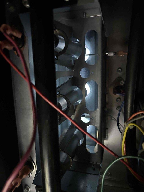 Performed scheduled care plan tune-up on customer's HVAC system. Inspected heat exchanger for proper operation and replaced customer-provided filters. Conducted electrical diagnostic testing with clamp meter, measuring 5.99 amps during operation to verify system is functioning within normal parameters.