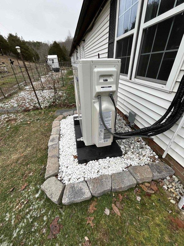Completed installation of indoor air handler by removing head unit from wall, installing support bracket on wooden mounting board to improve unit levelness, and replacing front cover kickstand in dining/living area. Performed proper refrigerant recovery, conducted triple evacuation, and recharged system to manufacturer specifications. Verified proper operation of outdoor heat pump unit and line set installation.