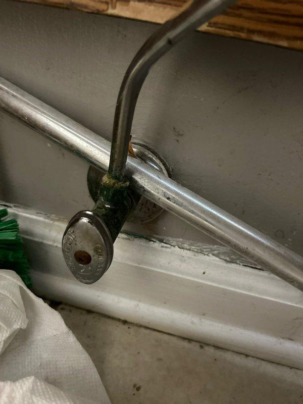 Responded to service call for toilet malfunction where water was spraying during use. Inspection revealed corroded supply line connection with visible water damage on surrounding wall. Replaced damaged braided supply line and valve assembly, resolving the leak issue. Tested toilet operation to confirm proper function with no water spray.
