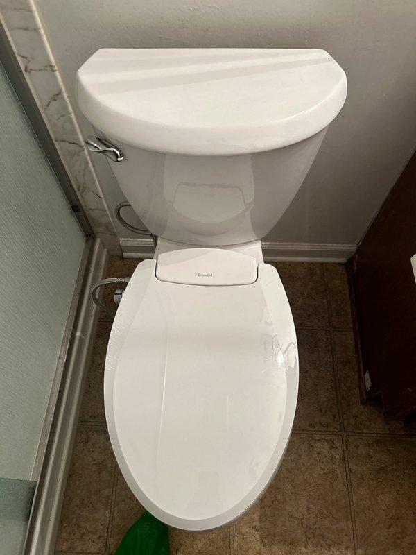 Conducted assessment for customer request to replace existing Brondell toilet and install new bidet. Documented current bathroom layout and fixture condition through detailed photos. Customer indicated fixtures will be GB supplied. Estimate provided for complete removal of existing toilet and professional installation of new toilet and bidet system.