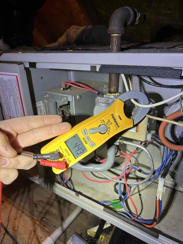 Performed scheduled Care Plan Tune Up on dual HVAC systems located in basement and attic. Conducted electrical testing with clamp meter showing 1.80A reading on one unit and inspected mechanical components including ductwork connections and fasteners. Customer will provide required filters (14x25x1, 16x25x1).