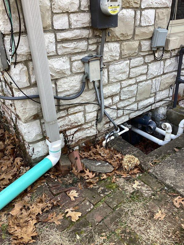 Conducted exterior assessment for generator installation, evaluating existing electrical service panel, utility connections, and potential mounting locations. Documented current electrical meter configuration and surrounding utility infrastructure to determine appropriate generator placement and connection requirements.