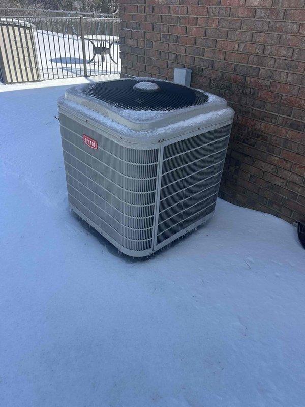 Responded to no heat call for 15-year-old Bryant electric system showing code 83 (low pressure lockout). Diagnostic testing revealed refrigerant pressure issues while blower was operational. Outdoor unit inspection showed significant ice/snow accumulation on condenser coil. Performed system pressure test and temperature differential measurements to confirm diagnosis. Cleared ice buildup, restored proper refrigerant levels, and verified normal operation before departure.