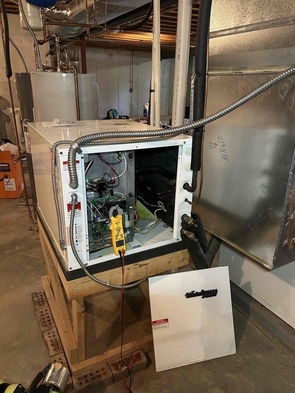 Performed diagnostic on 20+ year old geothermal HVAC system with dual-zone configuration. Identified low water pressure in one zone causing complete system failure. Testing of the GeoLINK Flow Center revealed circulation pump malfunction requiring replacement. Restored operation to both zones after pump replacement and system recharge.