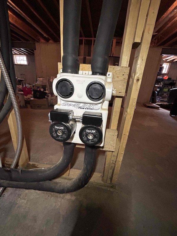 Performed diagnostic on 20+ year old geothermal HVAC system with dual-zone configuration. Identified low water pressure in one zone causing complete system failure. Testing of the GeoLINK Flow Center revealed circulation pump malfunction requiring replacement. Restored operation to both zones after pump replacement and system recharge.