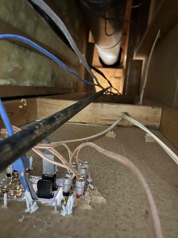 Installed new gas line to customer's fireplace, running black pipe with appropriate fittings from the existing gas supply. Secured pipe with metal mounting brackets and applied proper labeling at connection points to ensure safety compliance.