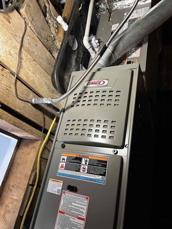 Successfully installed a complete Lennox HVAC system including a 66K BTU 80% gas furnace (ML180UH070E36AK), relocated 3-ton AC unit (ML14KC1-036-230), and new 3-ton evaporator coil (CK40HT-24A-71). System installation included new vent piping through roof, connection to existing thermostat, and all required safety components including gas/electrical shut-offs, flame roll-out protection, and SS2 coil drain safety water sensor.