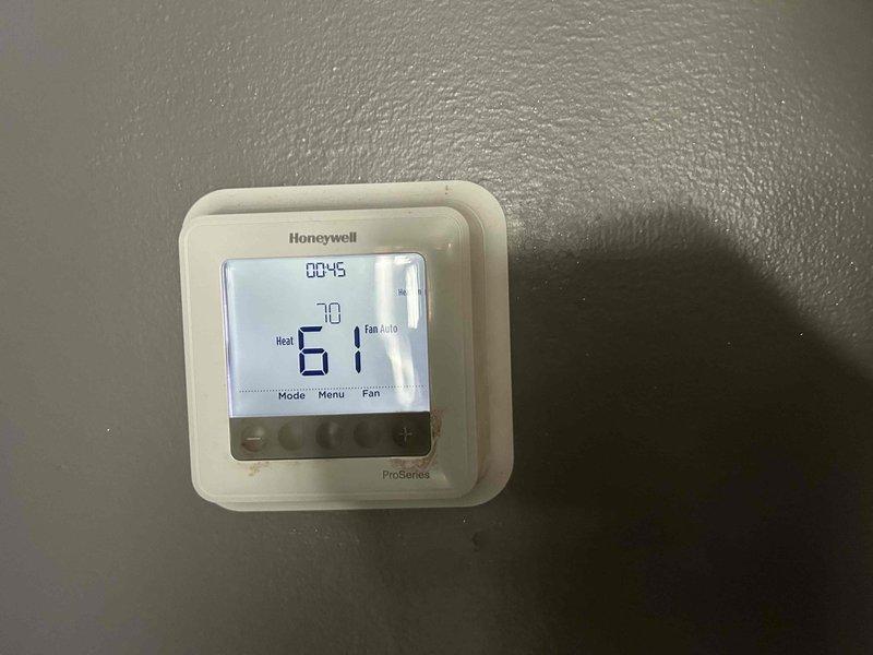 Responded to no heat call where customer reported system set at 70°F but reading 59°F. Diagnostic inspection revealed furnace attempting to cycle without error codes displaying on thermostat. Upon examination of the underfloor unit, identified and repaired faulty ignition sequence causing heat failure. System now operating correctly with verified temperature recovery from 61°F to setpoint.