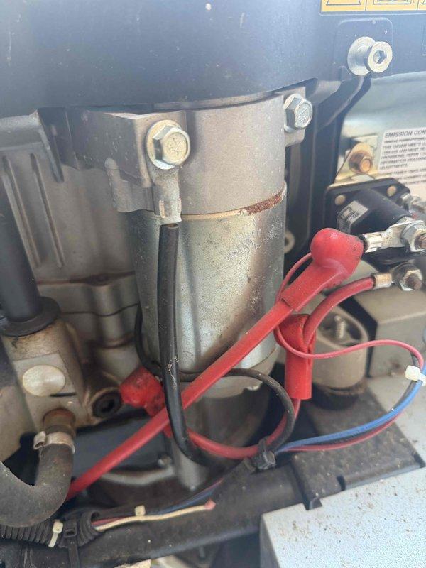 Performed service inspection on an unregistered Generac generator (Serial #6259212). Observed significant snow accumulation on the unit requiring clearance for proper ventilation. Noted corrosion on internal components and electrical connections requiring cleaning and treatment. Serviced engine assembly and verified all connections were secure and operational.