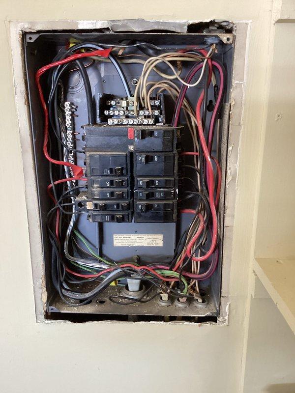 Conducted comprehensive inspection of electrical service panel for generator installation compatibility. Examined existing breaker configuration, bus bar capacity, and available spaces for new circuit installation. Evaluated wire routing options and load distribution to determine optimal connection point for standby generator system.
