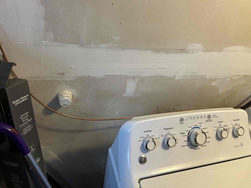 Conducted site visit to provide quote for Aprilaire 620A whole-home humidifier installation on recently installed Carrier heat pump/air handler system located in basement. Inspected existing HVAC setup including Skuttle component and associated ductwork to determine compatibility and optimal mounting location for requested humidifier. Photos taken of installation area for reference during quote preparation.