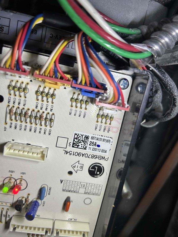 Completed replacement of two condensing motors, inverter board, and PCB board in commercial HVAC system. Installed new electronic control circuit board with multiple relay switches and properly reconnected all wiring to restore system functionality. All components were properly mounted and tested to ensure proper operation of the multi-zone control system.