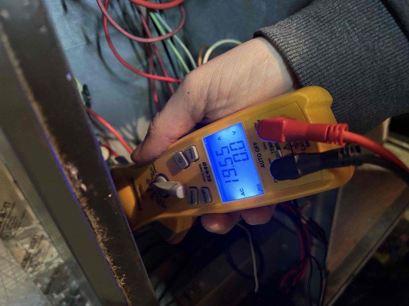 Performed routine care plan tune-up on dual Geox2 HVAC system with air handlers located in attic and basement. System is approximately 20 years old. Conducted electrical testing with multimeter showing 136.5V AC at connection points. Inspected furnace unit, ductwork, and associated components; system filters (20x25x5, 30x36x1) would be billable if supplied.