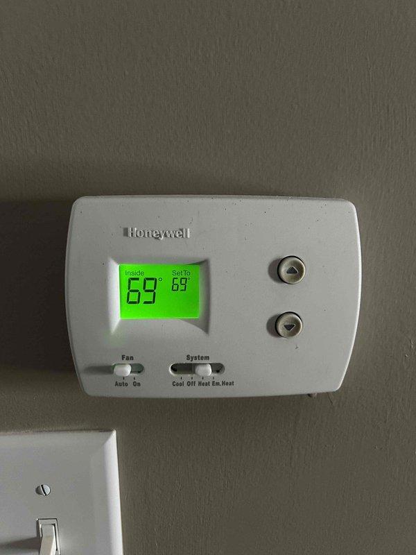 Responded to non-urgent service call for HVAC system making loud noise with unusual odor. Performed electrical diagnostics using multimeter, confirming voltage readings of 144V at the control panel. Inspected and tested thermostat functionality, which was operating correctly at set point of 69°F. Identified and resolved issue with system components causing the noise and odor.