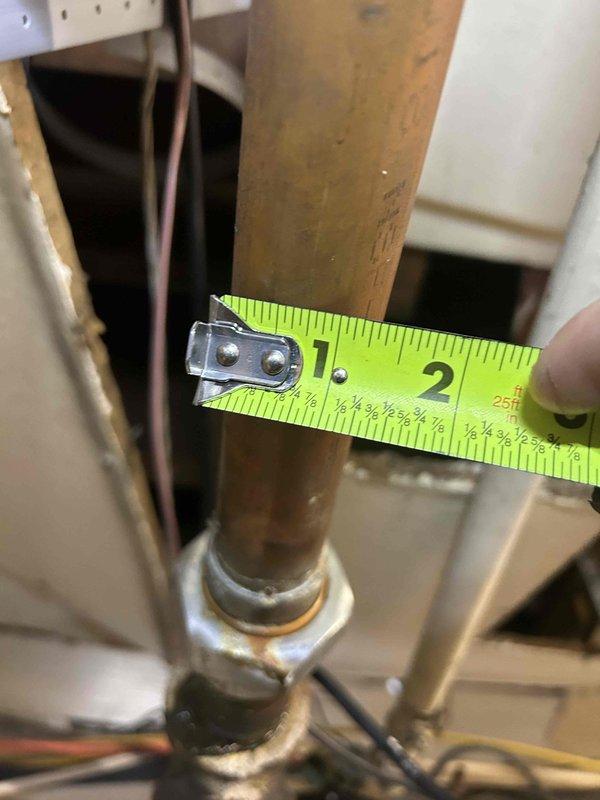 Responded to service callback regarding radiators not heating after previous boiler installation. Accessed property using key under front mat. Inspection revealed air trapped in the copper heating lines, which was preventing proper circulation to the radiators. Bled the system at available bleeder valves and verified proper operation of radiators after service.