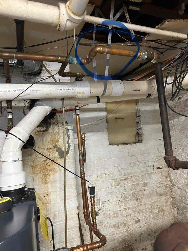 Responded to service callback regarding radiators not heating after previous boiler installation. Accessed property using key under front mat. Inspection revealed air trapped in the copper heating lines, which was preventing proper circulation to the radiators. Bled the system at available bleeder valves and verified proper operation of radiators after service.