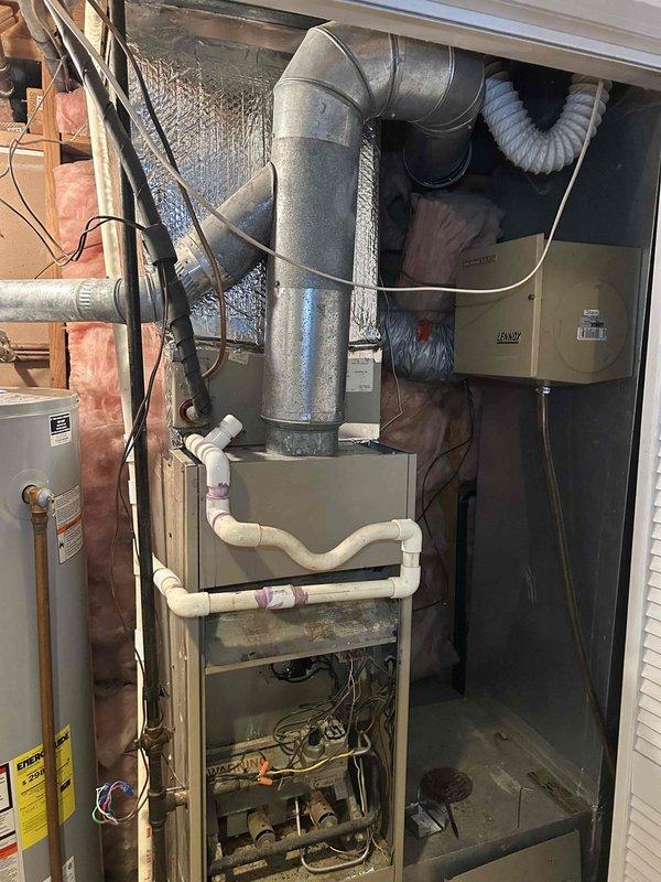 Responded to no-heat call for 40-year-old gas furnace that would only operate in fan-only mode. Diagnostic inspection revealed significant age-related wear on internal components and control mechanisms. Repaired faulty wiring connections in the control circuit and cleaned accumulated dust and debris from critical components to restore proper heating function.