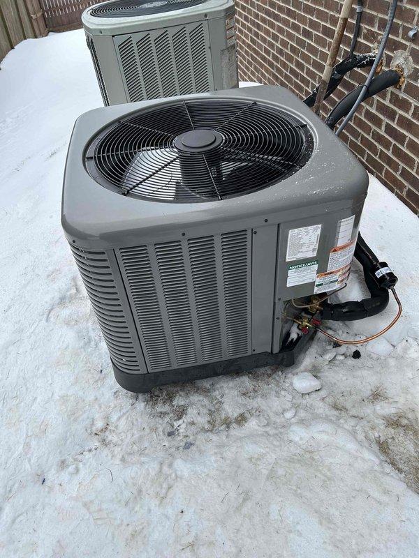 Successfully installed a RUUD 14.3 SEER2 2.5-ton Two Stage Heat Pump system on the second floor, including RUUD Air Handler with 15KW Heat Kit and digital thermostat (models RP14AY30AJ2NA, RH2TY3617STANNJ, RXBH-1724A15J-B). System installation included all necessary components: trap, SS2 coil drain safety water sensor, transition to existing ductwork, refrigerant line insulation, filter, electrical connections, and exterior unit placement with snow legs.
