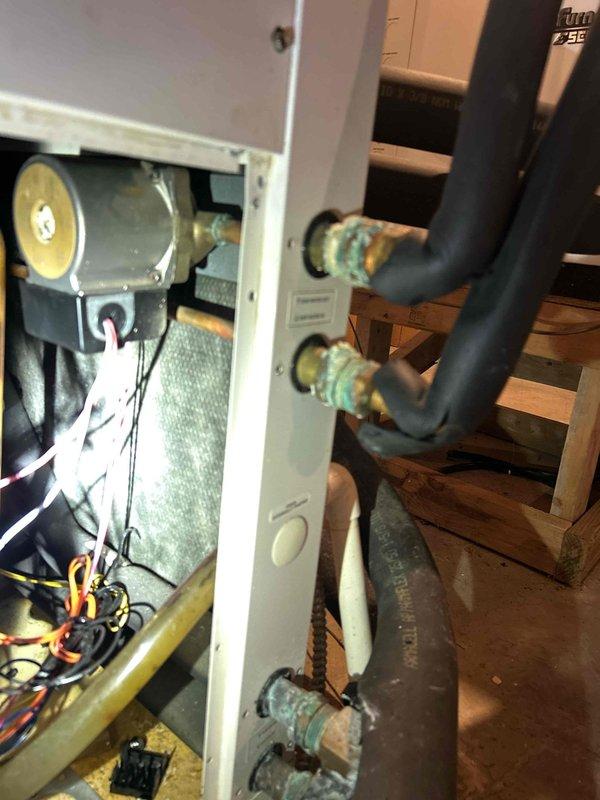 Replaced corroded DHW connectors on the geothermal system's desuperheater pump as per service request. Observed significant verdigris on brass fittings where black insulated pipes connect to the unit. Completed 60-point plumbing preventive service assessment while ensuring the desuperheater pump was turned off during repairs and reactivated upon completion.