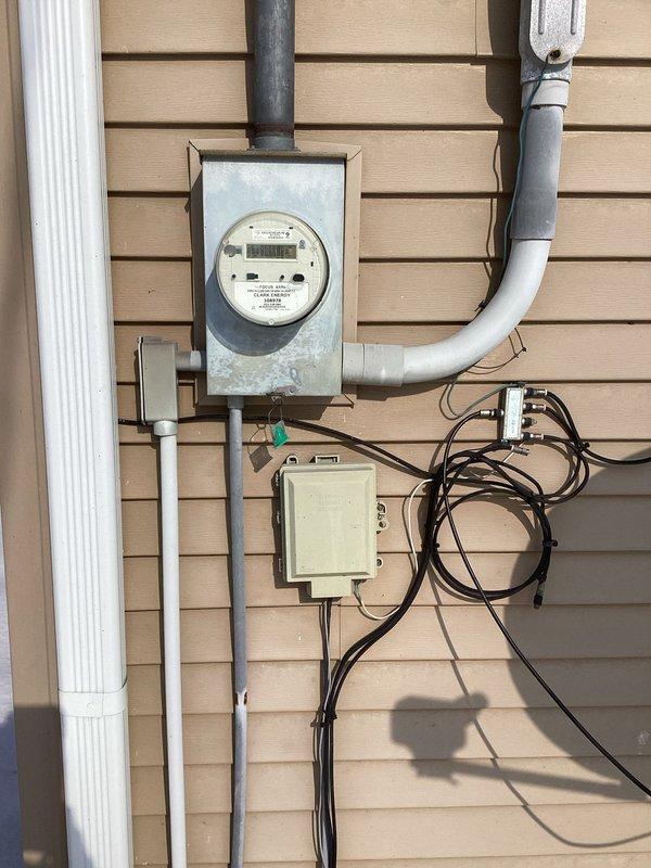 Conducted comprehensive generator installation assessment. Inspected existing gas supply system including wall-mounted regulator and associated piping. Evaluated electrical service capacity via meter examination to determine appropriate connection requirements and load capacity for proposed generator installation.