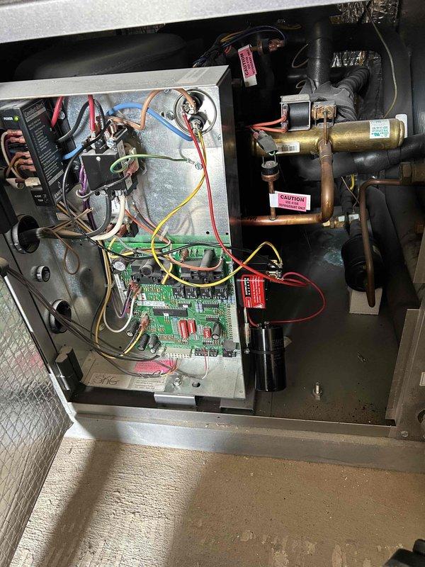 Completed full cleaning service on upstairs air handler, removing accumulated dust and debris from components and housing. Installed soft start kits on both compressors to reduce startup current draw and extend equipment life. System restored to proper operating condition with all electrical connections verified.