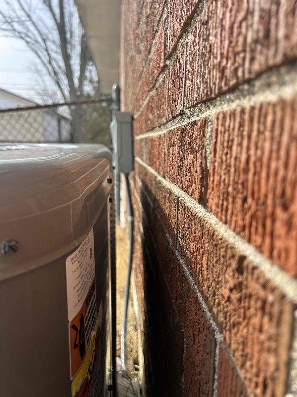 Completed Care Plan tune-up on heat pump/air handler system located in customer's closet. Inspected exterior unit mounted adjacent to brick wall and verified operation of smart thermostat (currently set to 56°F heat with 61°F indoor temperature). Customer supplies their own 20x25x1 filter for the system.