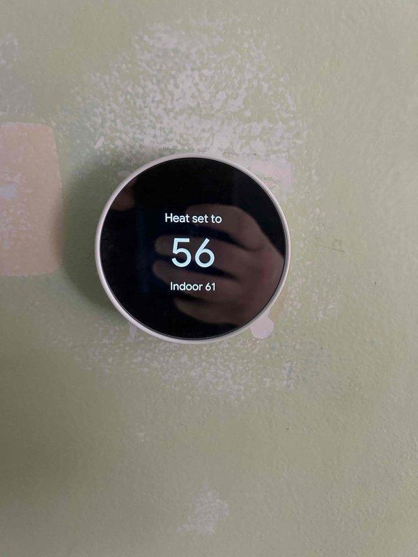 Completed Care Plan tune-up on heat pump/air handler system located in customer's closet. Inspected exterior unit mounted adjacent to brick wall and verified operation of smart thermostat (currently set to 56°F heat with 61°F indoor temperature). Customer supplies their own 20x25x1 filter for the system.