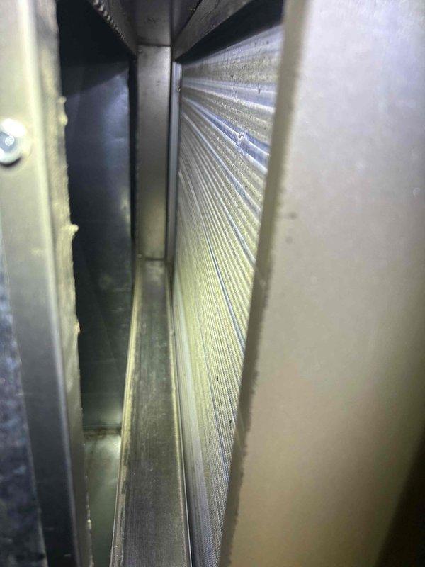 Performed scheduled Care Plan Tune Up on GEO indoor unit located in garage. Conducted visual inspection of heat exchanger fins and cooling coils, noting minor dust accumulation but no significant deterioration. Measured system temperature readings (22.2°) using UEi test instrument and verified proper operation of the system. Customer will provide replacement filters as discussed.