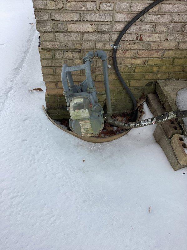 Conducted site assessment for generator installation at residential property. Evaluated exterior mounting location adjacent to existing HVAC equipment on brick wall. Documented current electrical setup including junction boxes and conduit paths for proper integration of new generator system.