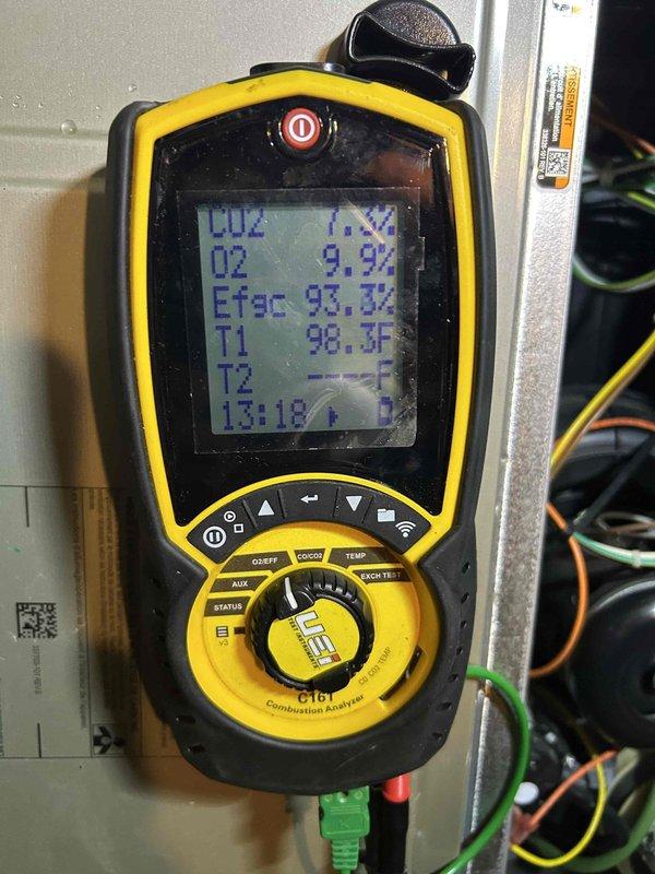 Responded to service callback regarding customer-reported gas odor following previous repair. Conducted thorough combustion analysis using UEi C161 and Fieldpiece C101 analyzers, which confirmed normal combustion parameters (CO2: 7.1%, O2: 9.9%, efficiency: 93.3%, temperature: 98.3°F). System operating within manufacturer specifications with no gas leaks detected.