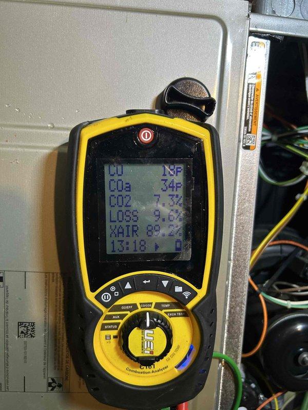 Responded to service callback regarding customer-reported gas odor following previous repair. Conducted thorough combustion analysis using UEi C161 and Fieldpiece C101 analyzers, which confirmed normal combustion parameters (CO2: 7.1%, O2: 9.9%, efficiency: 93.3%, temperature: 98.3°F). System operating within manufacturer specifications with no gas leaks detected.