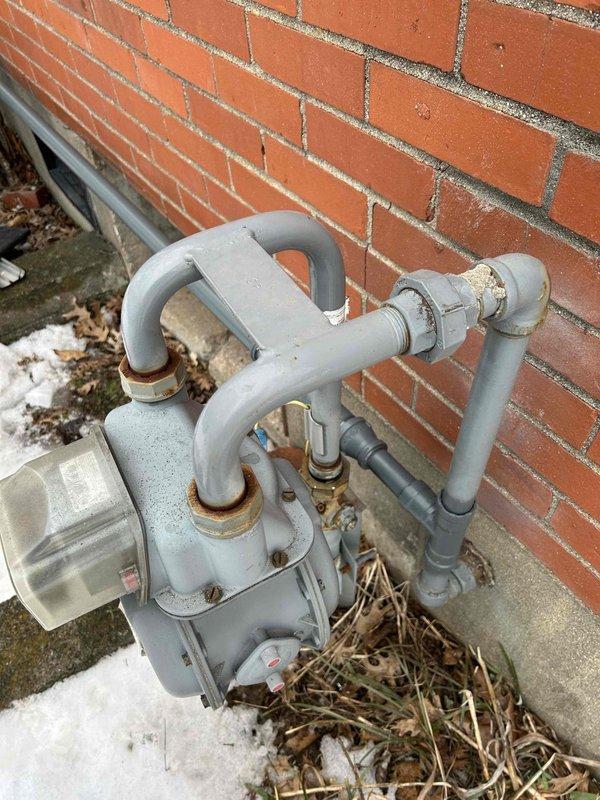 Completed installation of gas supply line to generator, connecting from the existing exterior gas meter through properly sized PVC piping with appropriate fittings and connections. Service included proper sealing of wall penetration and ensuring all connections were secure and leak-tested for safe operation.