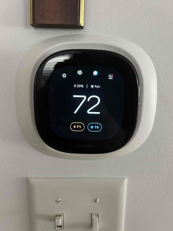 Performed Care Plan Tune Up service on the AC/gas furnace system located in attic. Inspected system components including condensate drain line and drain pan, which showed normal moisture collection. Verified proper operation of the digital thermostat which displayed 72° current temperature with heating (71°) and cooling (76°) setpoints functioning properly. Customer supplies their own filters as noted.