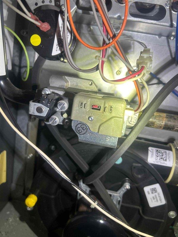 Responded to no-heat call for gas furnace system less than 10 years old. Upon inspection of the interior components, found faulty gas valve control module as evidenced by irregular indicator status. Replaced defective gas valve, reconnected all wiring harnesses to proper terminals, and verified proper operation through complete heating cycle. System now functioning normally with consistent flame and appropriate heat output.