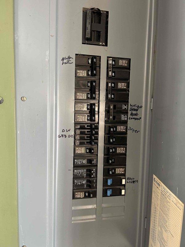 Performed inspection of washer receptacle after customer reported one outlet causing panel humming when washer was connected. Examined electrical panel for potential surge issues or maintenance needs. Inspected panel wiring connections and breaker functionality. Replaced back-stabbed receptacle in laundry room with properly wired device. Removed outdated fluorescent fixture in laundry room and installed new LED fixture. Changed several light bulbs in high ceiling fixtures (8'-10' height).