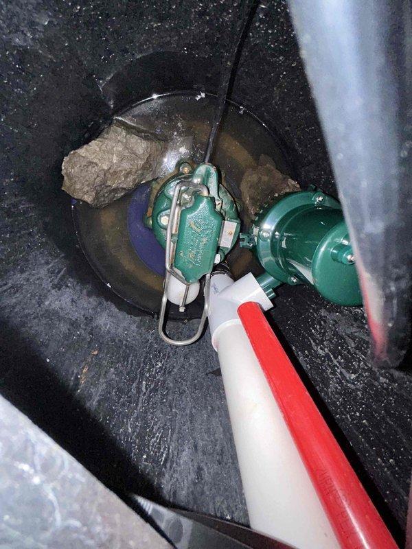 Installed new Zoeller battery backup sump pump system with secondary pump powered by Aquaflow battery. System includes secondary float switch that activates during power outages or primary pump failure. Properly connected to existing discharge line and verified complete system functionality with no leaks before completion.