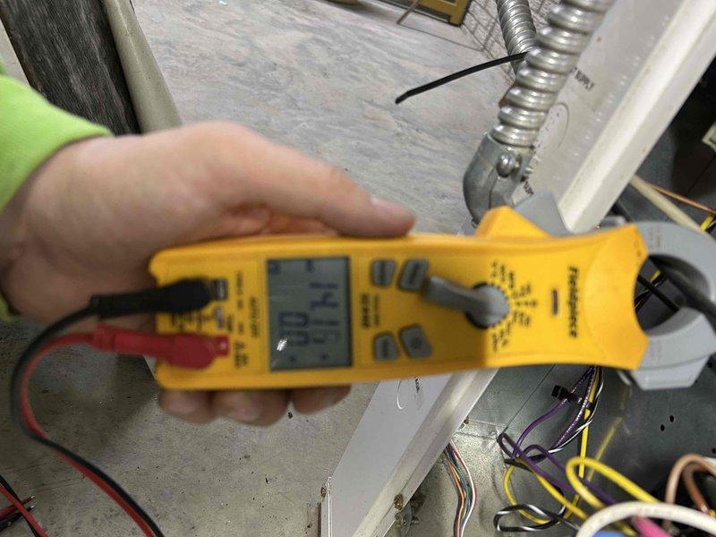 Performed Care Plan Tune Up on Spectra Geo heat pump system located in customer's basement. Conducted electrical testing using Fieldpiece multimeter to verify proper voltage and connections. Inspected ductwork and system components, confirming unit is operating within specifications.