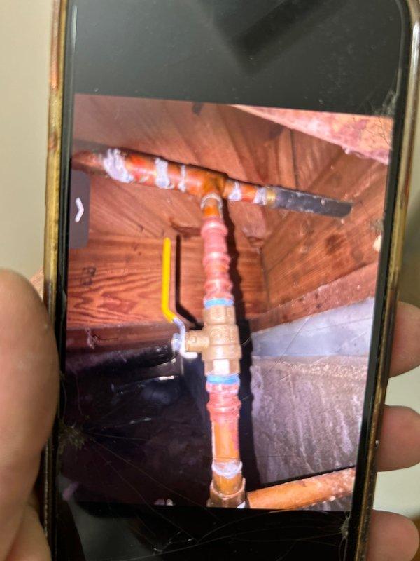 Responded to service call for toilet leak. Identified corroded supply valve with rusting base plate as source of constant leak. Replaced damaged valve and braided metal supply line, ensuring proper connection to copper supply pipes. Tested system for proper operation and verified no further leakage.