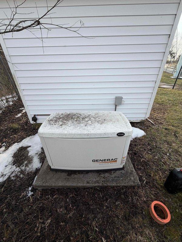 Performed routine maintenance on residential Generac air-cooled generator. Inspected unit for external condition, noting some weathering on the housing. Checked control panel functionality, verified main 7.5 AMP fuse integrity, and confirmed proper AUTO/OFF/MANUAL switch operation. System displaying 17.9 run hours with no operational issues detected.