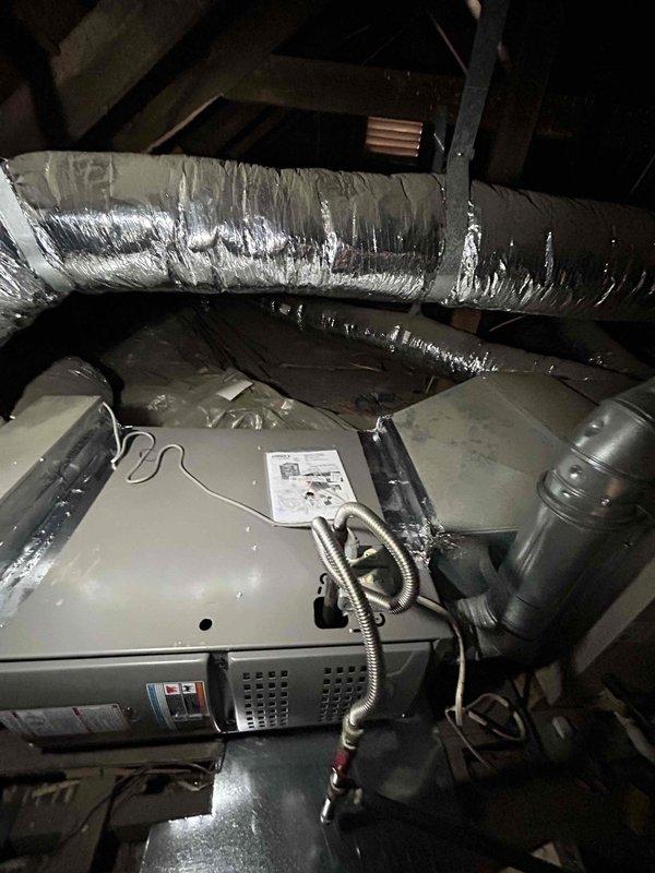 Successfully installed a Lennox 70K BTU 80% efficiency gas furnace (ML180UH070E36AK) in attic location with digital thermostat. Completed all necessary connections including flue piping, electrical/gas shut-off switches, flexible gas line connector, and installed flame rollout protection. Unit was properly secured with all required safety features and labeled as Unit #6 with mitigation controls left on site for future AC/coil replacement.