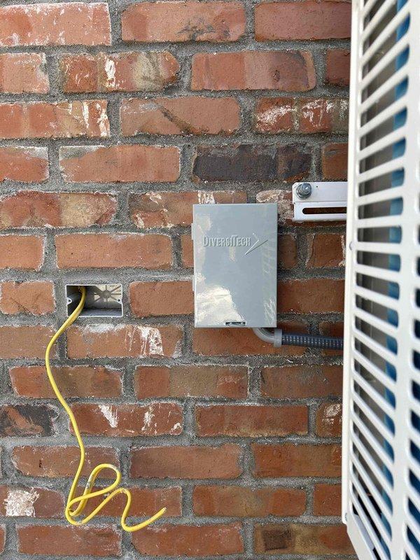 Returned to site to complete HVAC installation warranty work. Successfully evacuated the garage system and performed full system startup as previously scheduled. Verified proper operation of the Mitsubishi Electric thermostat (currently set to Heat mode at 66°F) and confirmed installation of the Diversitech electrical junction box on the exterior wall.