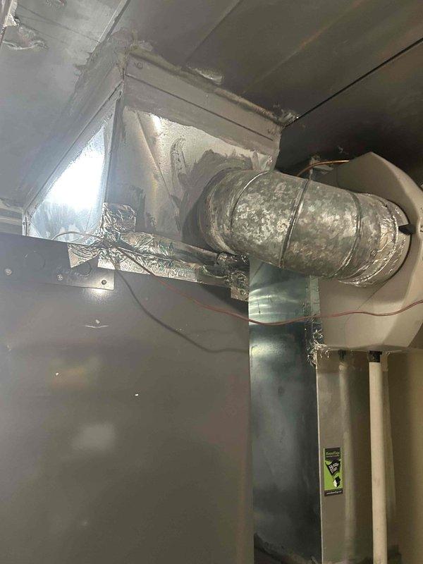 Successfully installed a complete RUUD two-stage heat pump system, including a 14.3 SEER2 5-ton heat pump outdoor unit, 5-ton air handler, and 20KW heat kit. System includes Honeywell T-10 Pro with sensor placed in basement, comprehensive ductwork connections, and all necessary components including outdoor pad, snow legs, electrical connections, and safety features.
