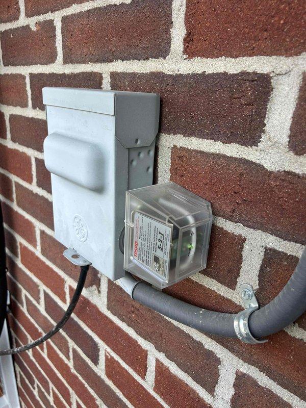 Completed Care Plan Tune Up on dual heat pump system with two air handlers and mini-split (ticket 1 of 2). Inspected mini-split unit mounted on white paneled wall and verified proper electrical connections to LCS monitoring device installed on brick wall. Coordinated with Geo technician on-site for comprehensive system maintenance.