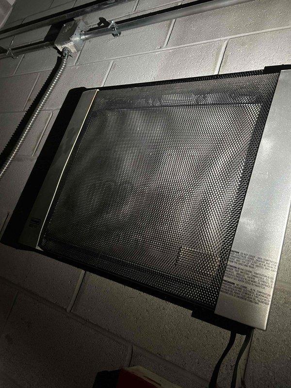 Completed scheduled repair at Movie Tavern by replacing the control board on a DeLonghi SAFEHEAT wall-mounted HVAC unit. Two technicians were required to safely complete the installation on the unit mounted to concrete block wall. Parts were sourced and prepared ahead of service call per commercial client PO #2026-088.