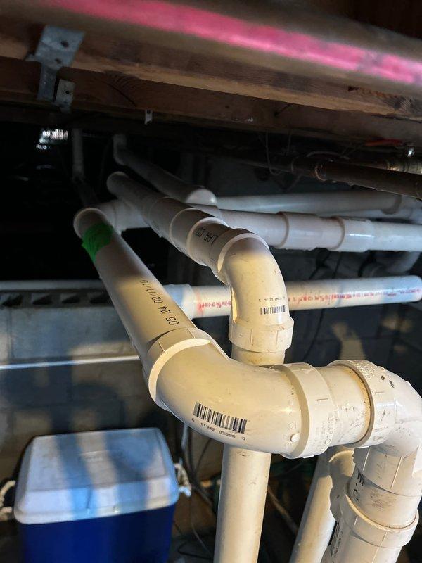 Responded to service call for continuously running sump pump. Diagnosed frozen discharge line as the cause and temporarily rerouted discharge to main sewer line. Identified leak on backup water pump line. Will return to reconnect sump pump to existing discharge line and repair the backup pump line leak.
