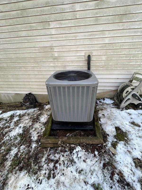 Successfully installed complete RUUD heat pump system, including 14.3 SEER2 two-stage 3-ton heat pump (RP14AY36AJ2NA), matching 3-ton air handler (RH2TY3617STANNJ), and 15KW heat kit (RXBH-172415J-B) with digital thermostat. Installation included all necessary components: outdoor unit pad, snow legs, electrical connections, refrigerant line insulation/filter, condensate trap, SS2 coil drain safety water sensor, and transition to existing ductwork.