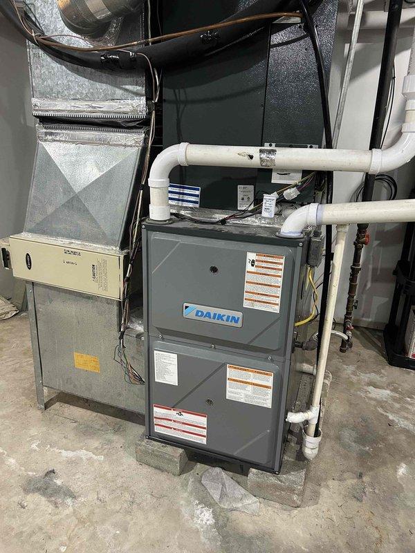 Performed scheduled maintenance on Daikin furnace system with connected humidifier (Generalaire #990-13 pad). Inspected and serviced both indoor furnace unit and outdoor AC condenser. Customer-provided 20x25x4 filter was installed during service.